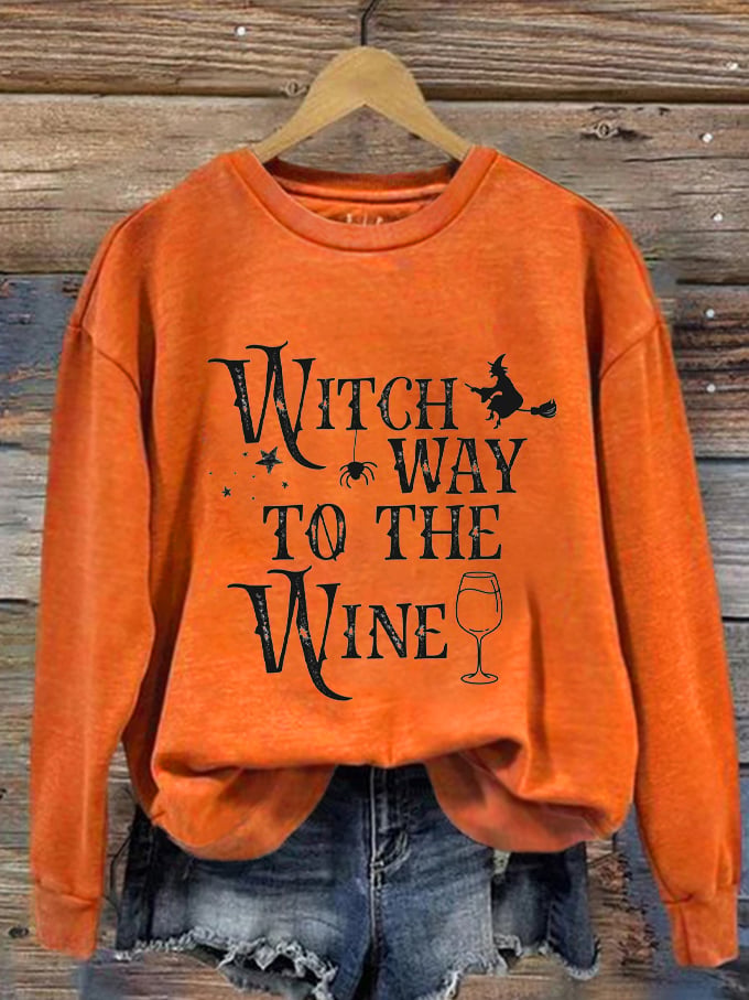 8d19ae7ba5566027da0845c603c1f691aca4c3610a4c07c844bd34d6d9d15714.jpg Women's Halloween Witch Way To The Wine Print Sweatshirt - Image 1